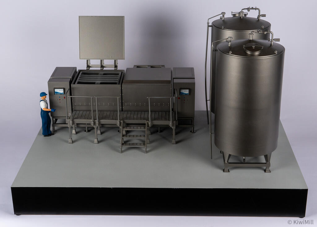 Sous vide cook tank scale model with one lid raised, an operator figure at the platform and two water tanks beside it